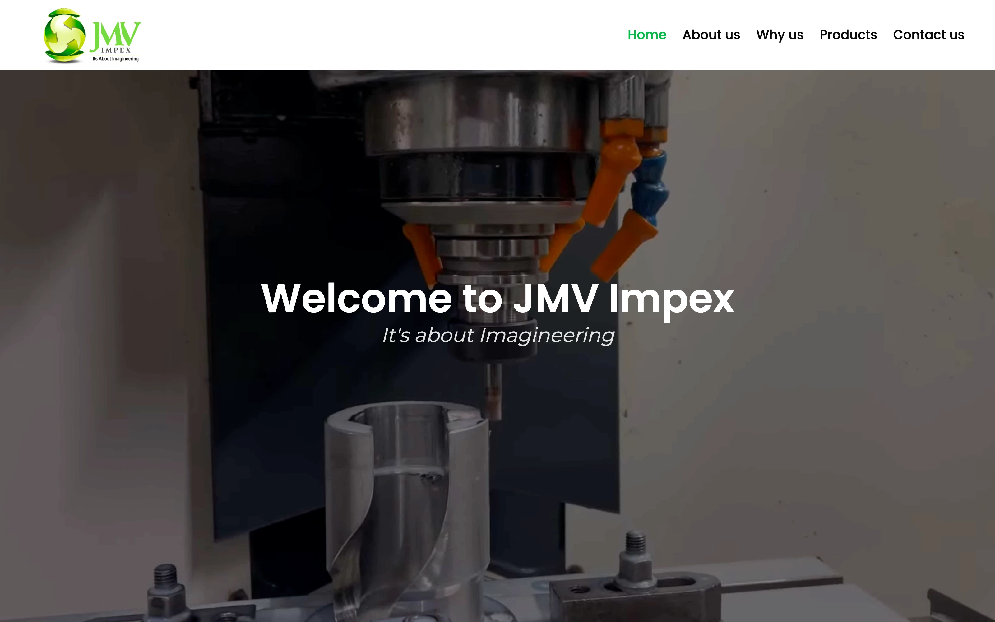 JMV Impex homepage, with the company name over footage of a CNC machine cutting a part